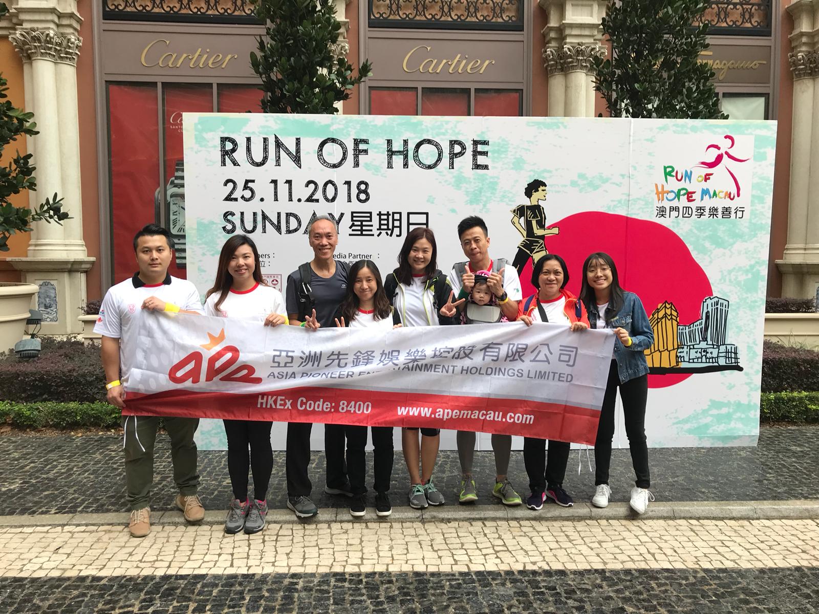 APE volunteer team members and families take part in The Run of